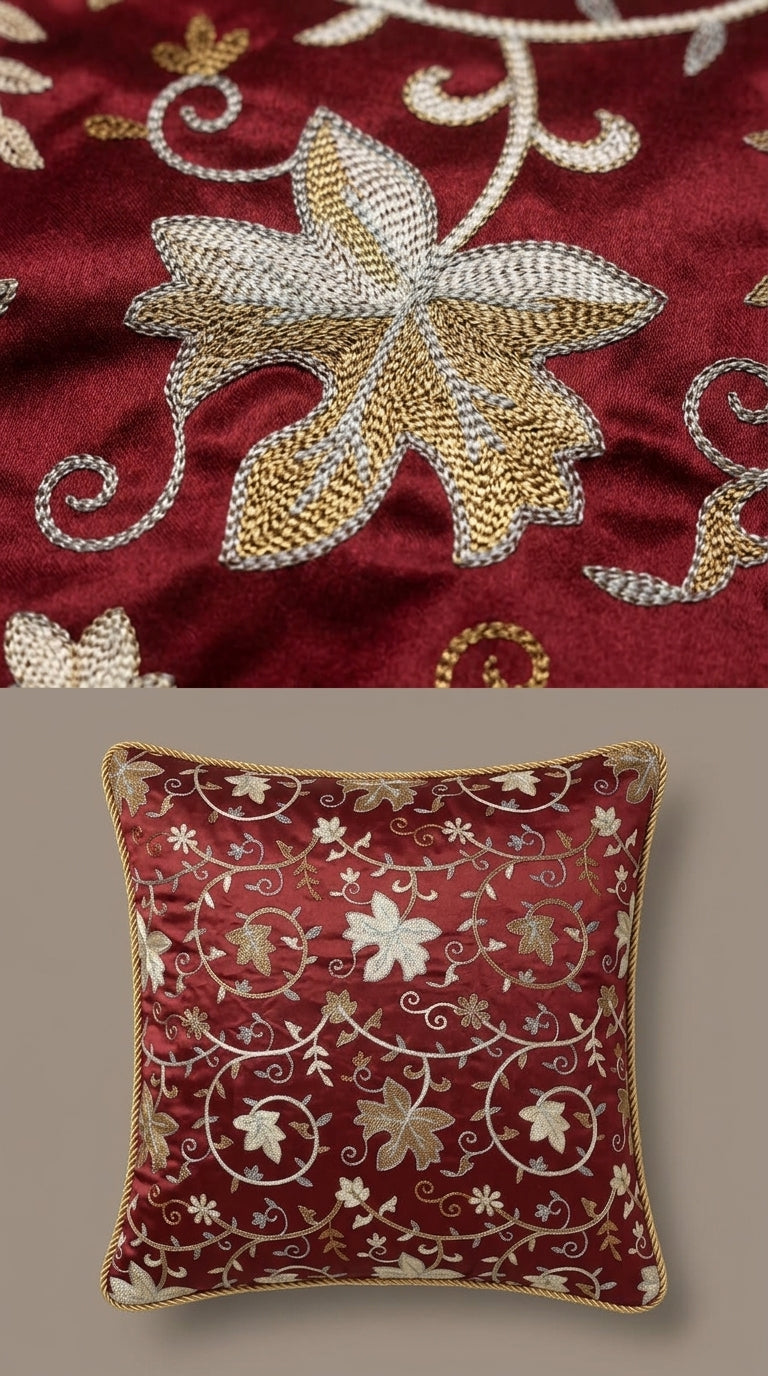 Decorative pillow with floral embroidery on a red background