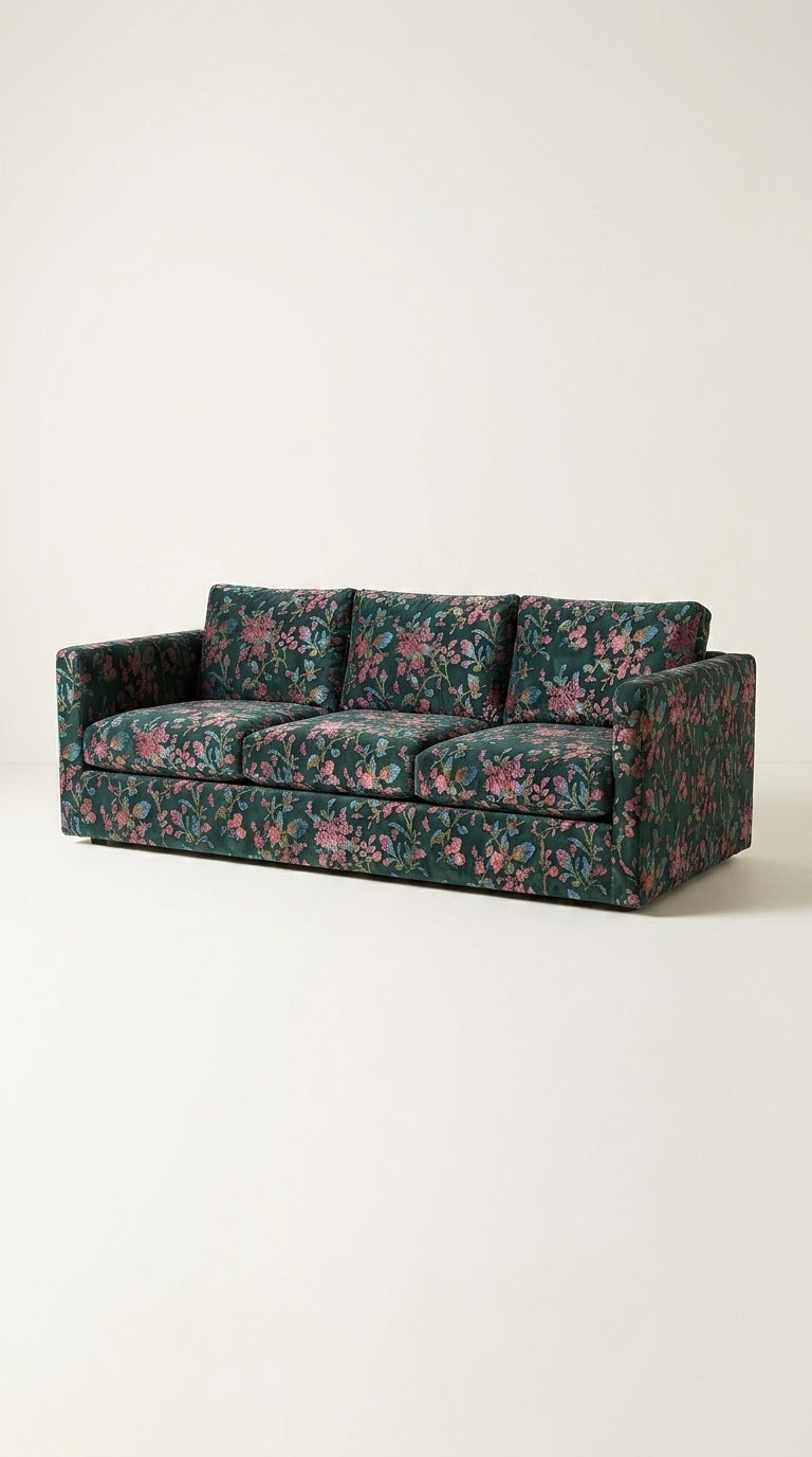 Floral-patterned sofa on a white background